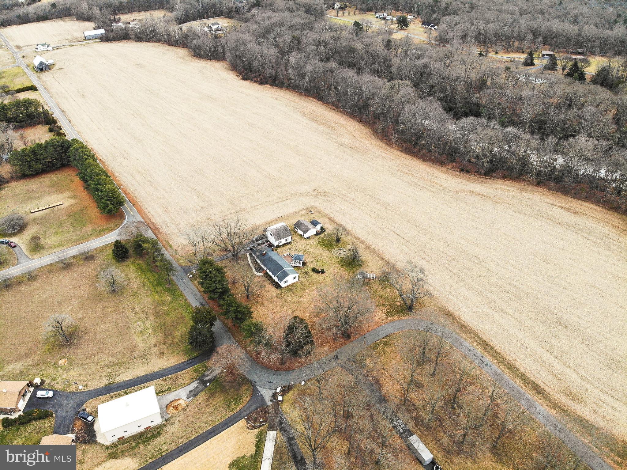 3406 Horn Road Huntingtown, MD 20639 - Photo 72 of 74 Serene countryside retreat with open fields.