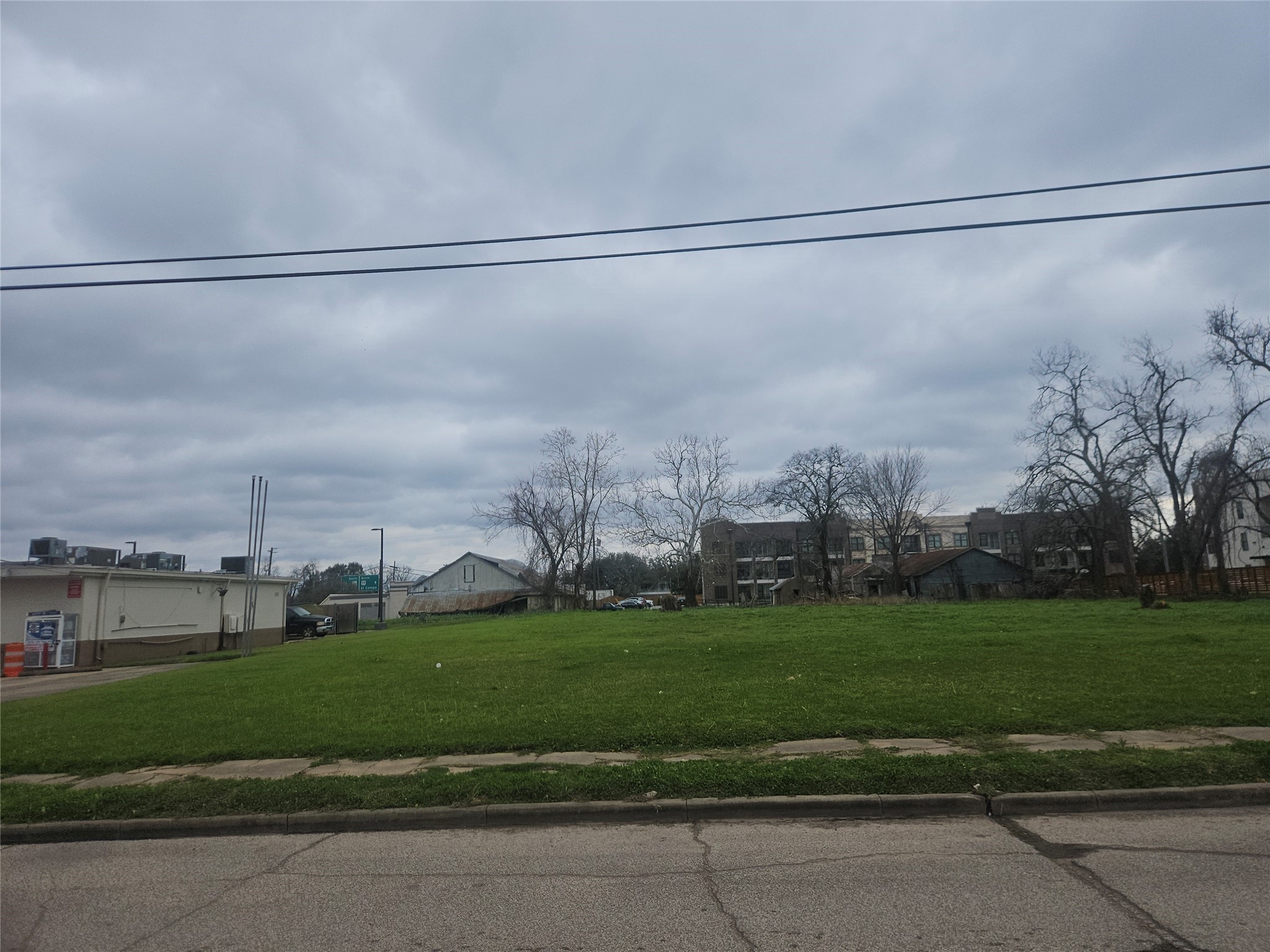 0 West Caney Street Wharton, TX 77488 - Photo 2 of 5 a view of a big yard next to a yard