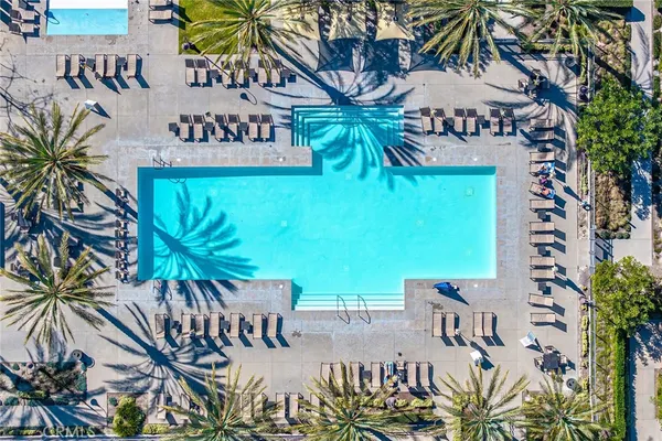 a view of outdoor space with swimming pool and lounge chair