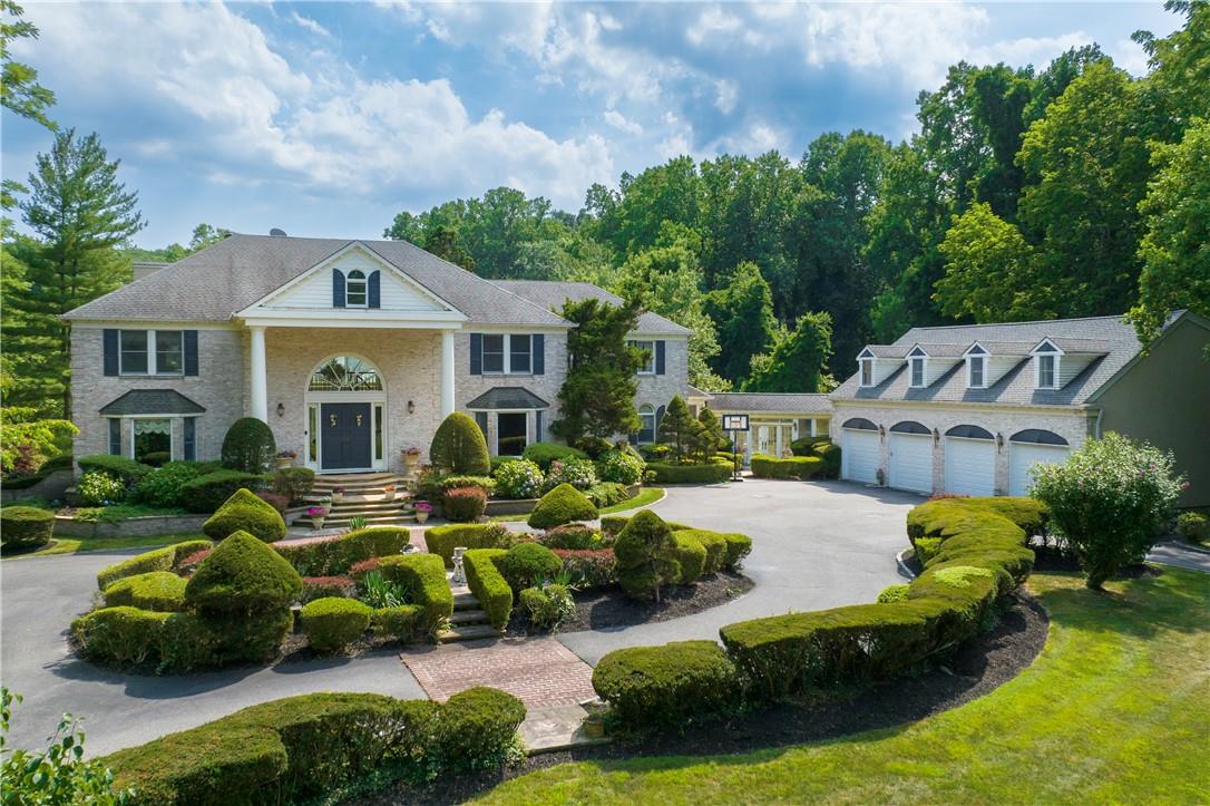 23 Fort Salonga Road Centerport, NY 11721 - Photo 1 of 1 a front view of house with yard and green space