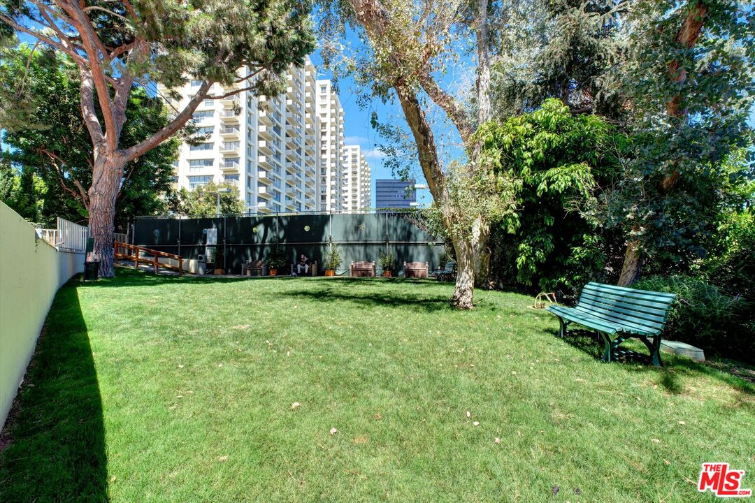 2160 Century Park East, Unit 103 Los Angeles, CA 90067 - Photo 20 of 37 a view of a park with large trees