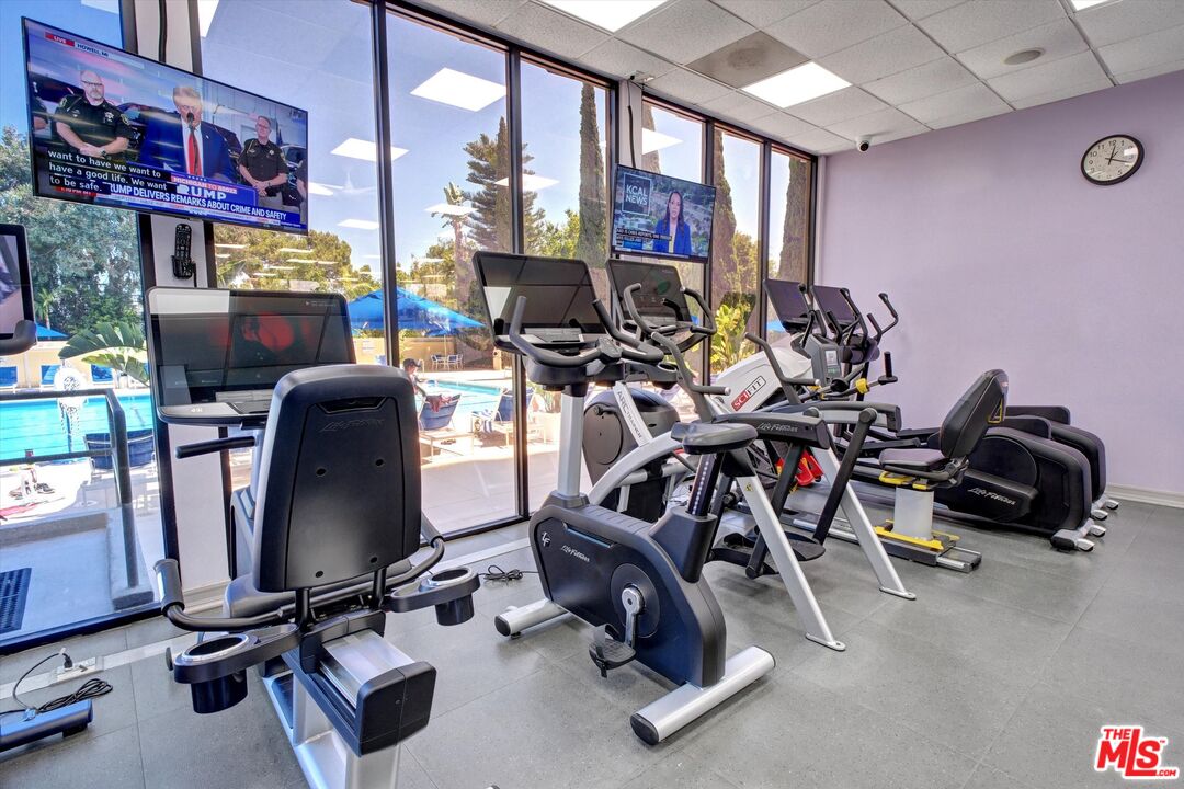 2160 Century Park East, Unit 103 Los Angeles, CA 90067 - Photo 32 of 37 a view of a room with gym equipment