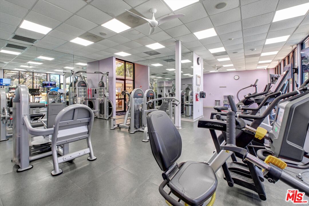 2160 Century Park East, Unit 103 Los Angeles, CA 90067 - Photo 34 of 37 a view of a room with gym equipment