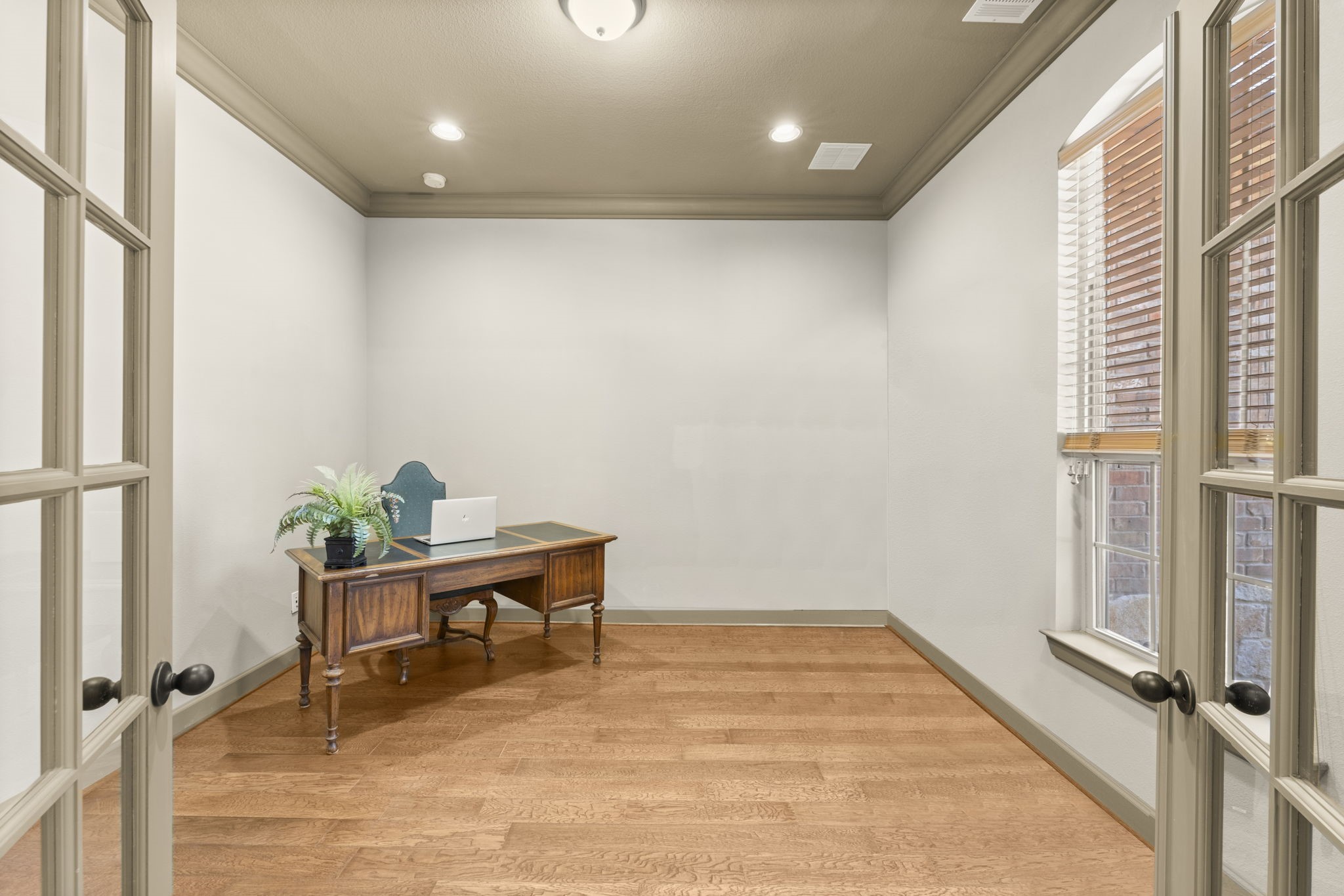 1534 Virgie Community Road Magnolia, TX 77354 - Photo 13 of 50 Walk through the French doors to your new personal office. Make a statement in this room with beautiful furniture or use as a true home office that you will never want to leave.