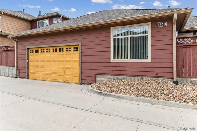 an aerial view of a swimming pool and outdoor space