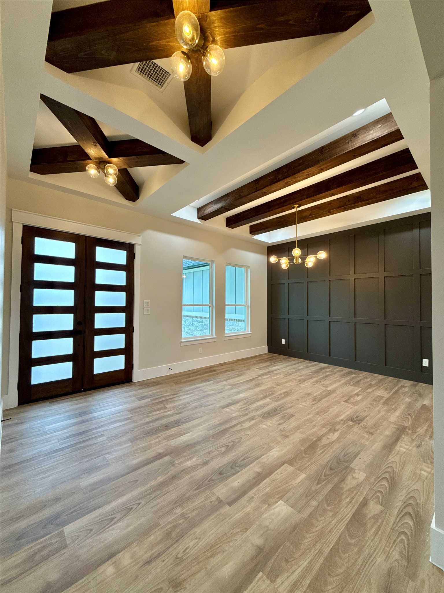 1214 Quarter Horse Trail Angleton, TX 77515 - Photo 4 of 32 a bedroom with a bed and a ceiling fan