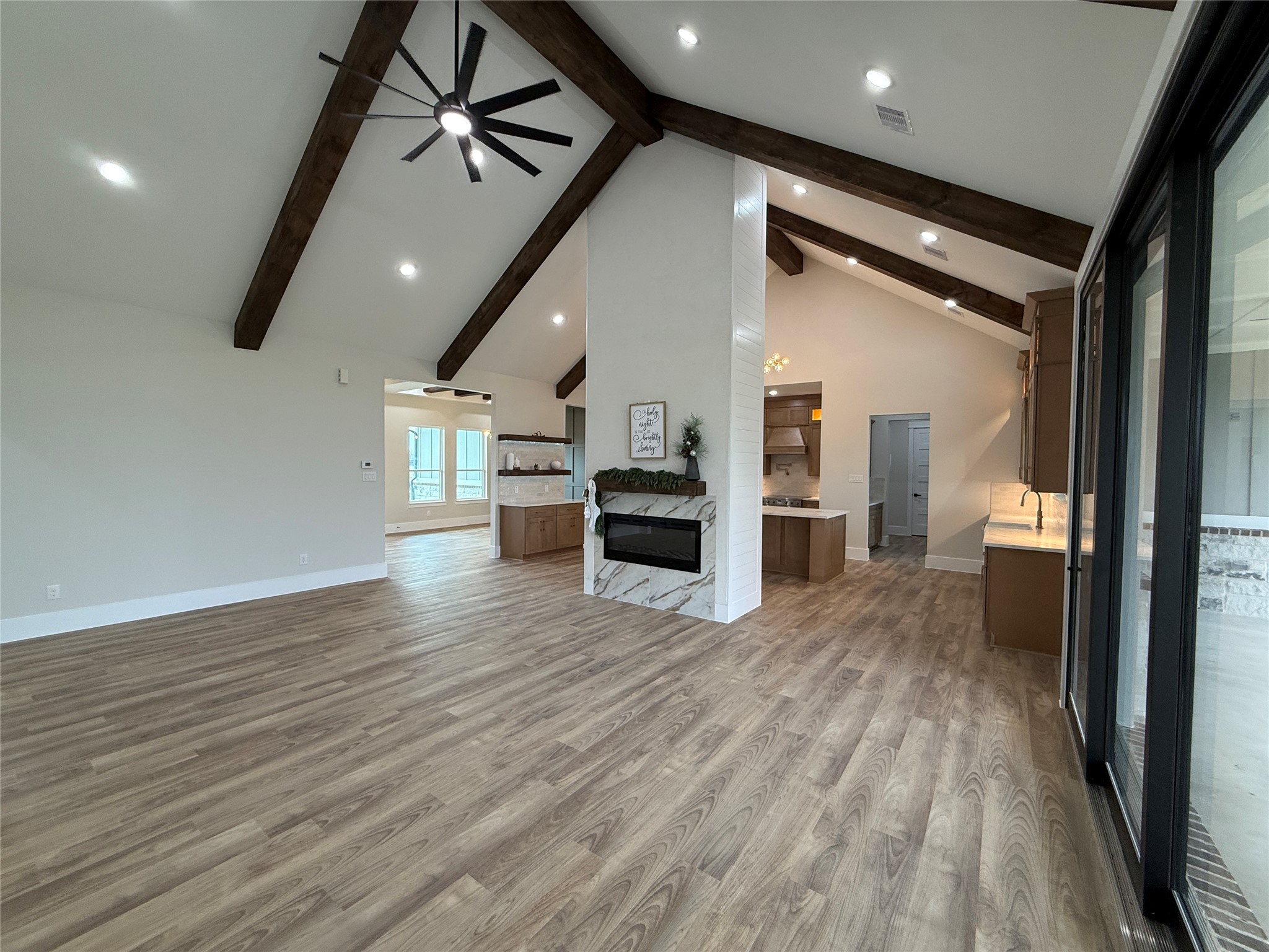 1214 Quarter Horse Trail Angleton, TX 77515 - Photo 7 of 32 a view of a kitchen with a sink and an empty room