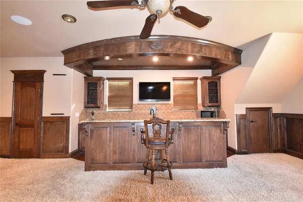 a view of a livingroom with furniture and window