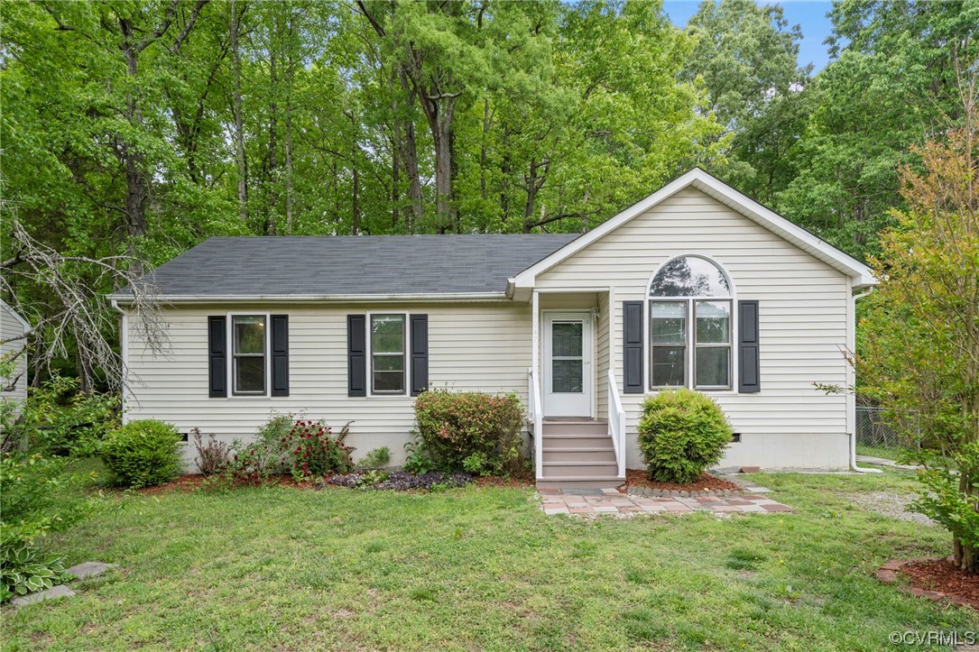 3047 Gregwood Road Midlothian, VA 23112 - Photo 1 of 35 a view of a house with a yard plants and large tree