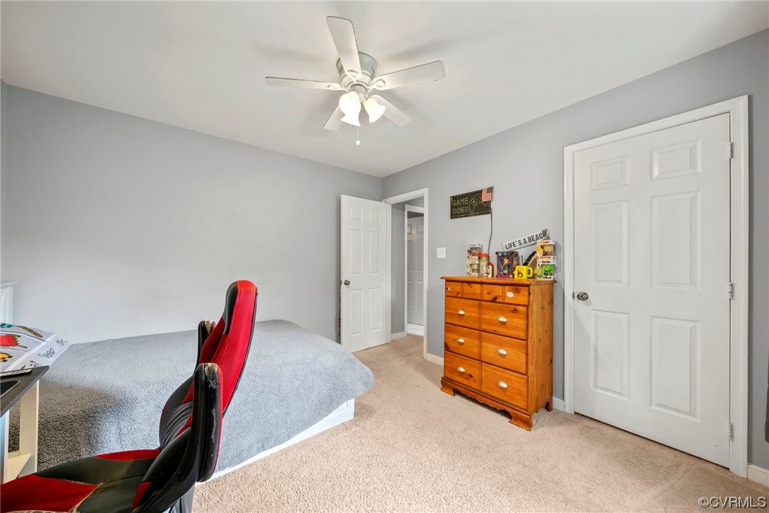 3047 Gregwood Road Midlothian, VA 23112 - Photo 24 of 35 a view of a bedroom with cabinet closet and windows