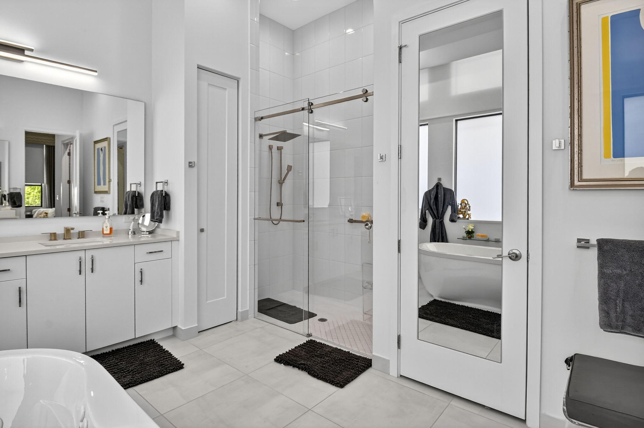 8331 Royal County Down Road Boca Raton, FL 33434 - Photo 14 of 30 a bathroom with a sink a toilet and shower