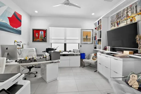 a room with furniture and a flat screen tv