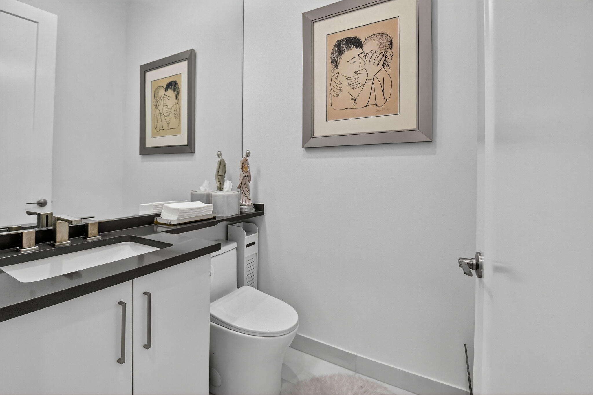 8331 Royal County Down Road Boca Raton, FL 33434 - Photo 20 of 30 a bathroom with a granite countertop sink mirror and toilet