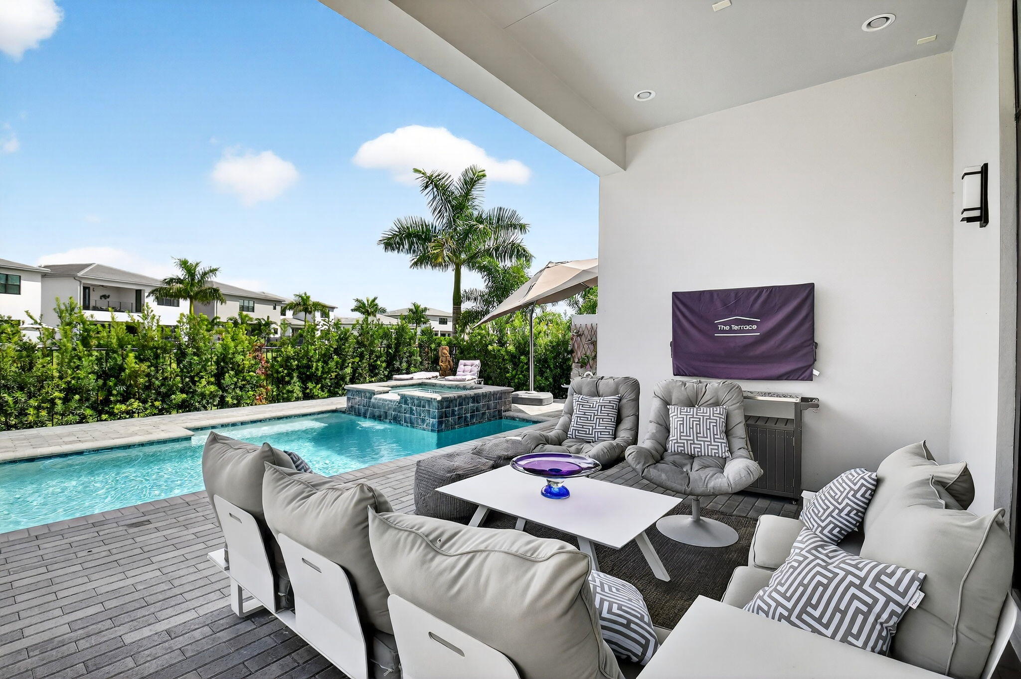 8331 Royal County Down Road Boca Raton, FL 33434 - Photo 25 of 30 a living room with furniture and a potted plant
