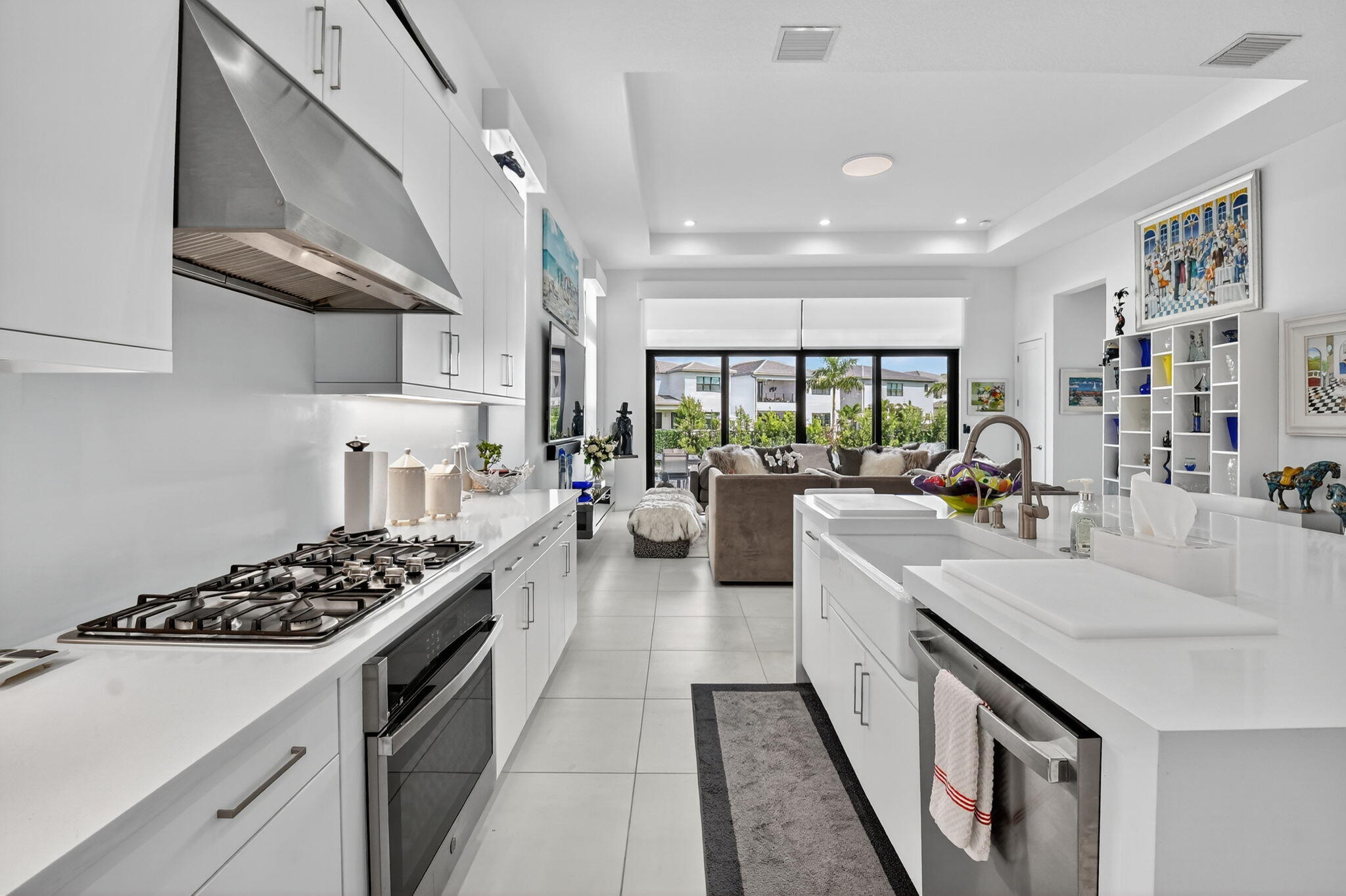 8331 Royal County Down Road Boca Raton, FL 33434 - Photo 6 of 30 a large kitchen with stainless steel appliances granite countertop a lot of counter space and a sink