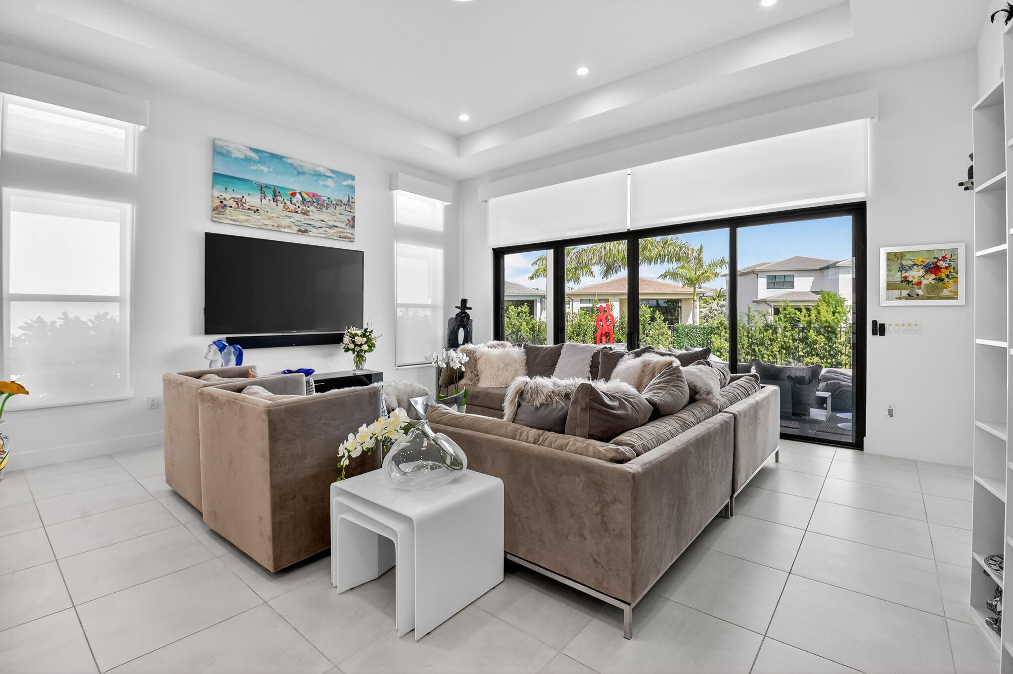 8331 Royal County Down Road Boca Raton, FL 33434 - Photo 9 of 30 a living room with furniture and a flat screen tv
