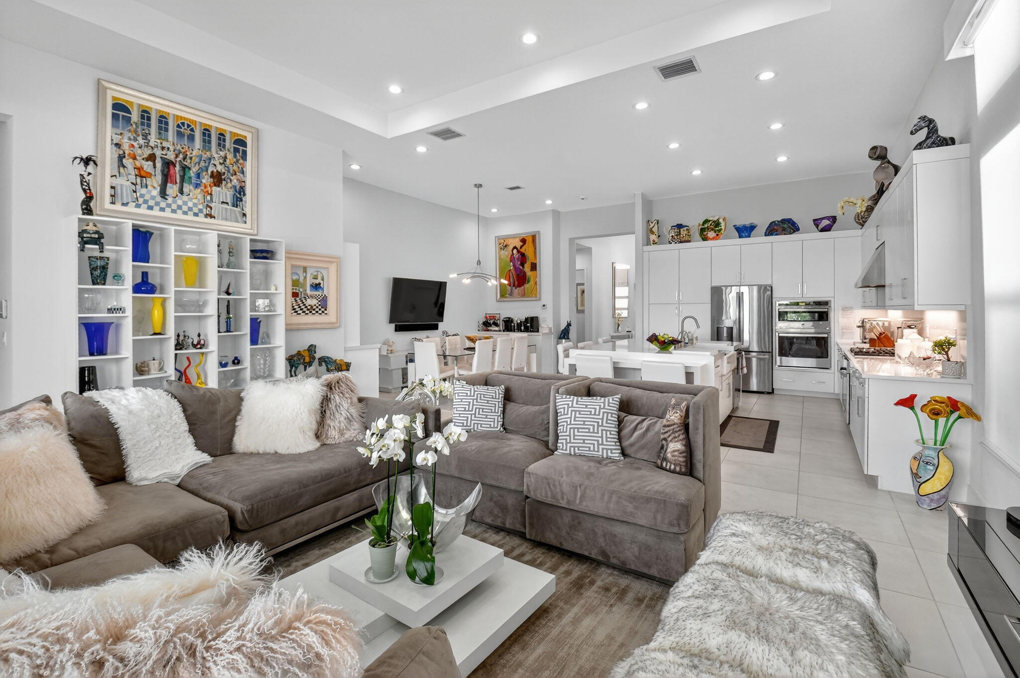 8331 Royal County Down Road Boca Raton, FL 33434 - Photo 10 of 30 a living room with furniture and a flat screen tv