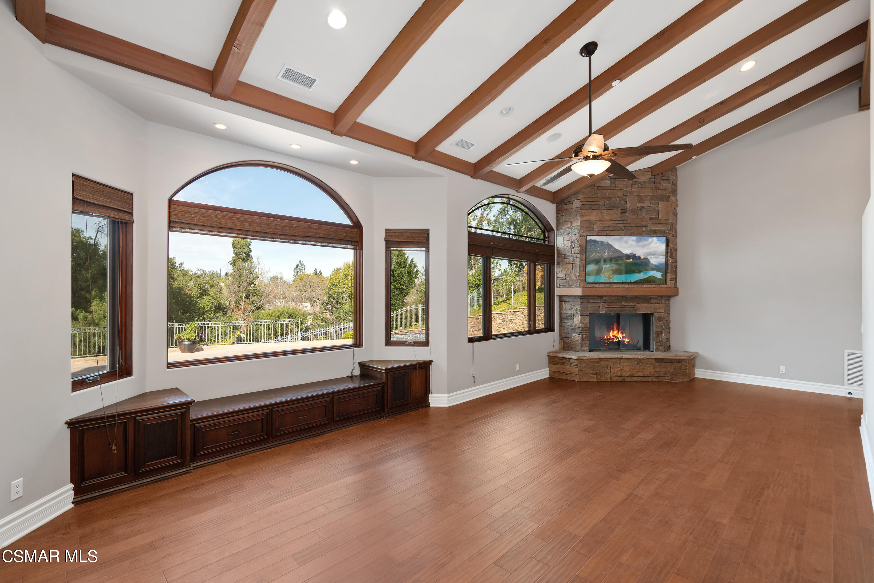 446 Rancho Road Thousand Oaks, CA 91362 - Photo 8 of 55 a view of an empty room with wooden floor and a window