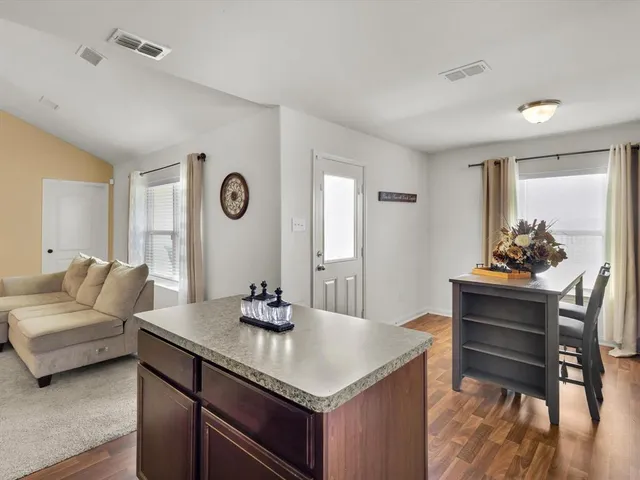 a house view with a garden space