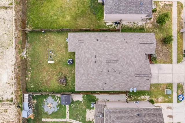 a bathroom with a tub and shower