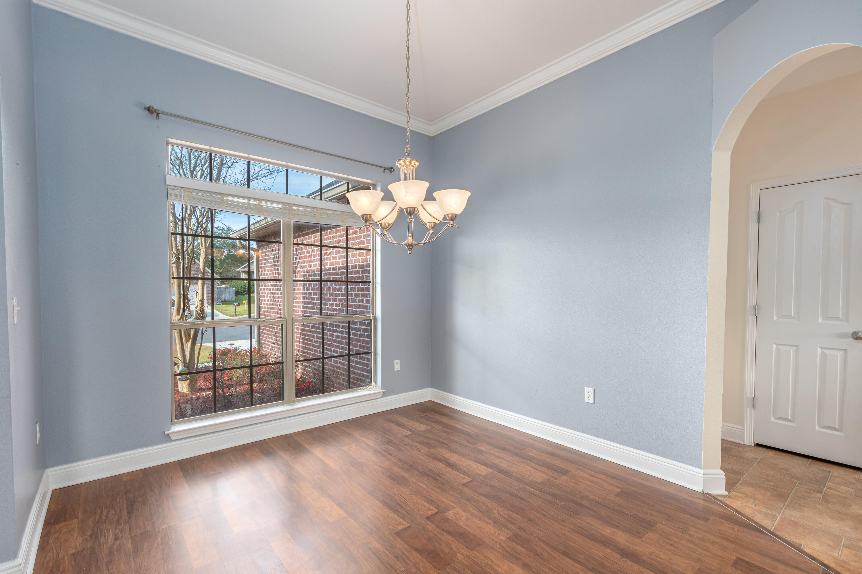 606 Rowan Circle Crestview, FL 32536 - Photo 2 of 24 a view of a room with wooden floor