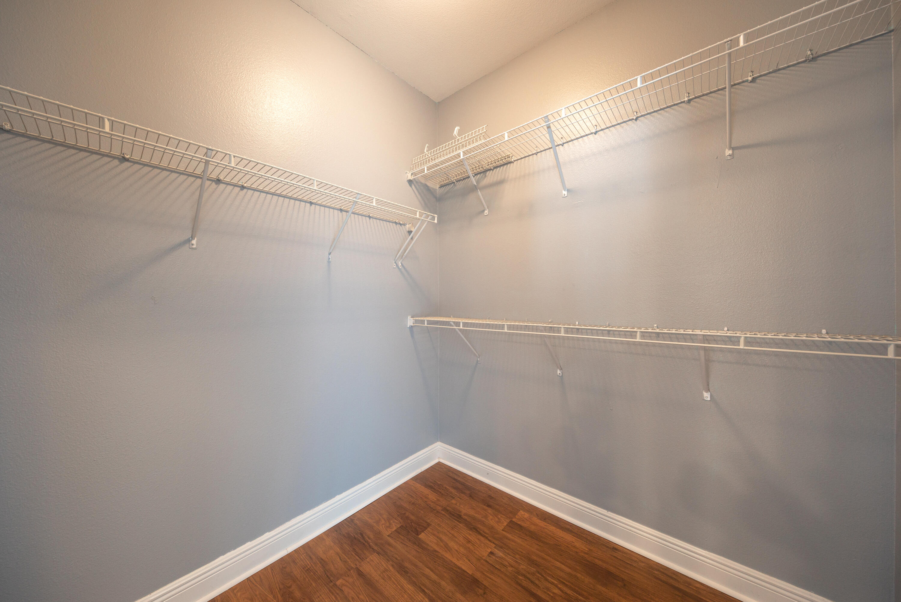 606 Rowan Circle Crestview, FL 32536 - Photo 20 of 24 a view of a room with racks on the wall