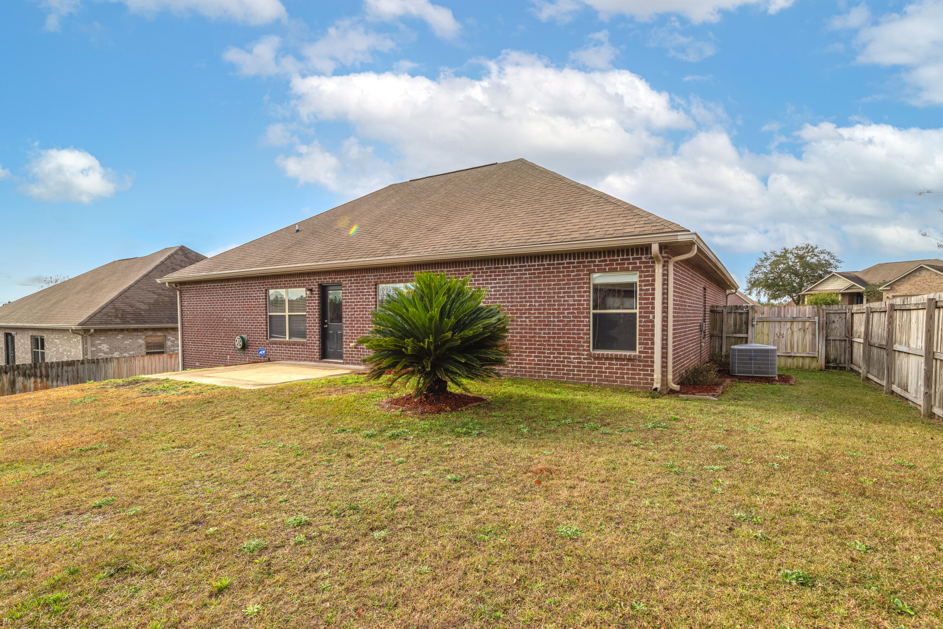 606 Rowan Circle Crestview, FL 32536 - Photo 23 of 24 a house view with a garden space
