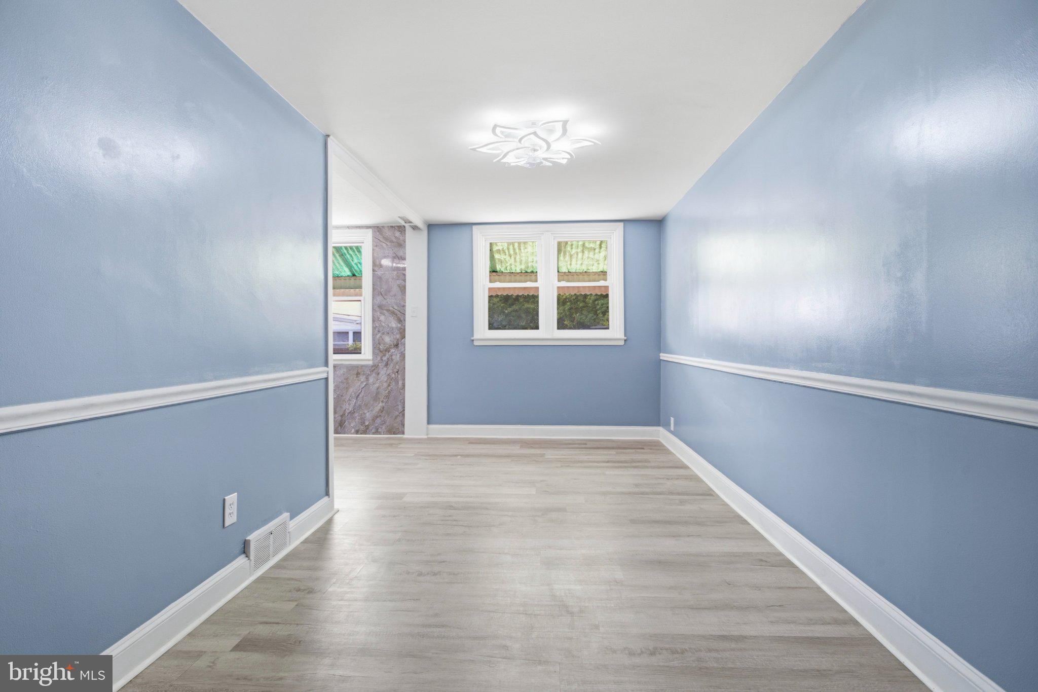 151 Alverstone Road Clifton Heights, PA 19018 - Photo 9 of 33 Bright and airy blue-walled space.
