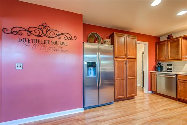 1083 General George Patton Road, Unit 1083 Nashville, TN 37221 - Photo 7 of 18 Renovated Kitchen has plenty of cabinetry including a cabinet Pantry. Refrigerator remains. So does washer and dryer.