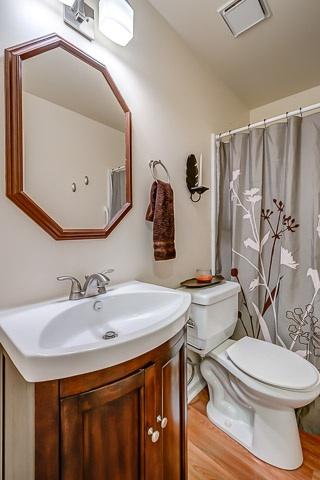 1083 General George Patton Road, Unit 1083 Nashville, TN 37221 - Photo 10 of 18 Full bath of Main level Bedroom. Hardwood floor.