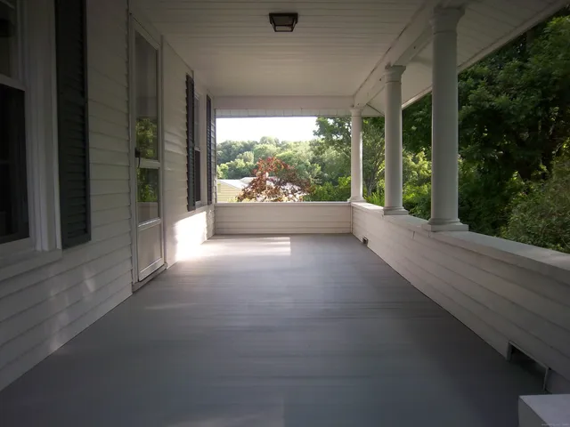 a view of a garden with an outdoor space
