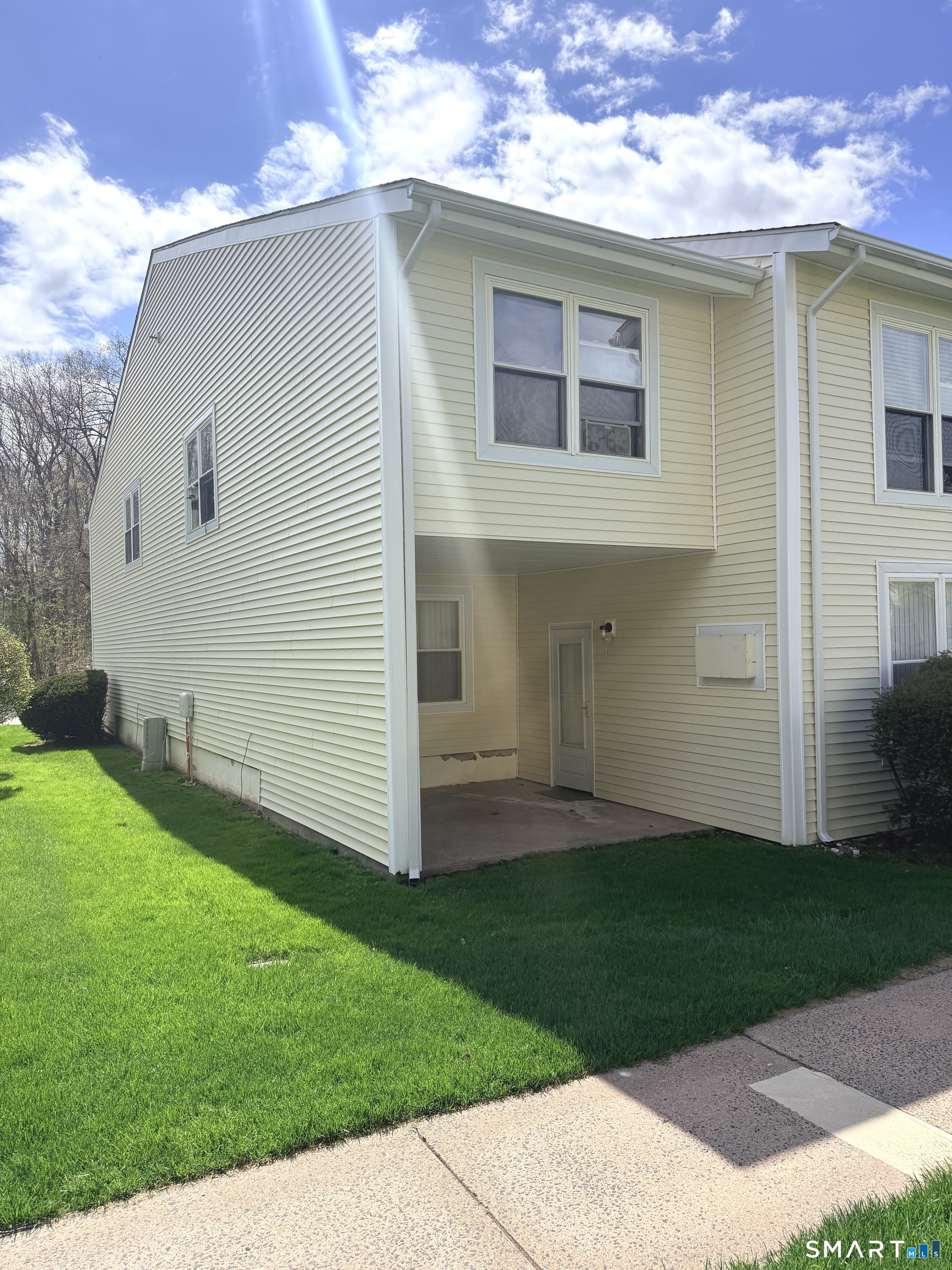 801 Pleasant Valley Road, Unit 801 South Windsor, CT 06074 - Photo 1 of 1 a view of back yard of the house
