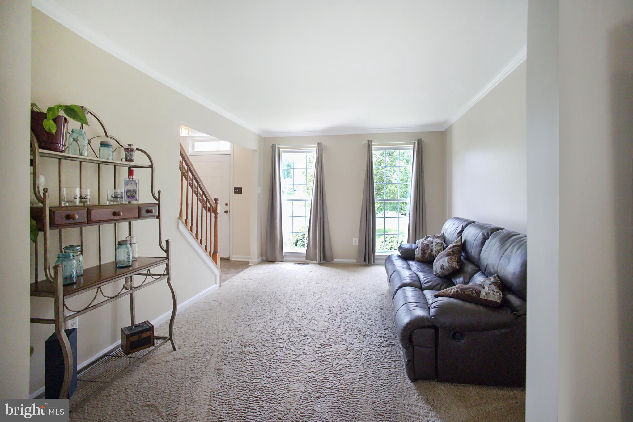 6008 Sandy Ridge Elkridge, MD 21075 - Photo 10 of 31 Living Room with floor to ceiling windows