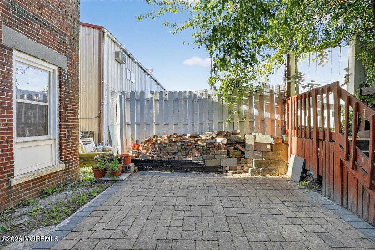 55 East Front Street Keyport, NJ 07735 - Photo 32 of 42 a view of a back yard of the house