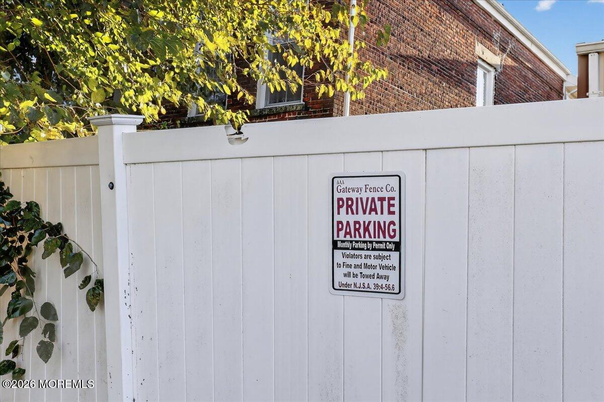 55 East Front Street Keyport, NJ 07735 - Photo 39 of 42 a view of sign board with tree in front of it
