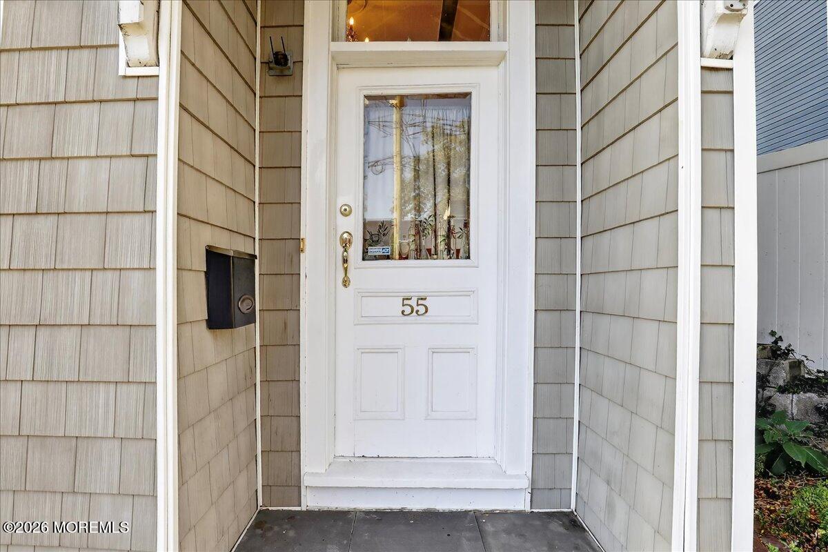 55 East Front Street Keyport, NJ 07735 - Photo 7 of 42 a view of a glass door with a window