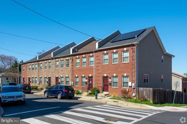 a car parked in front of a building
