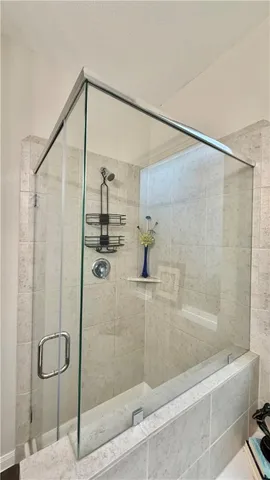 a bathroom with a sink vanity and a mirror