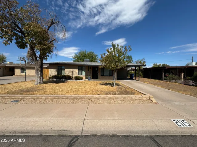 a house view with a outdoor space