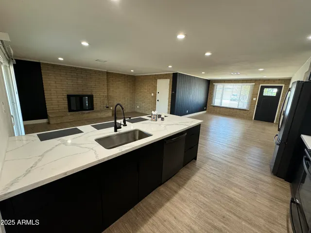 a bathroom with a sink double vanity and a mirror