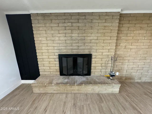 a living room with a fireplace