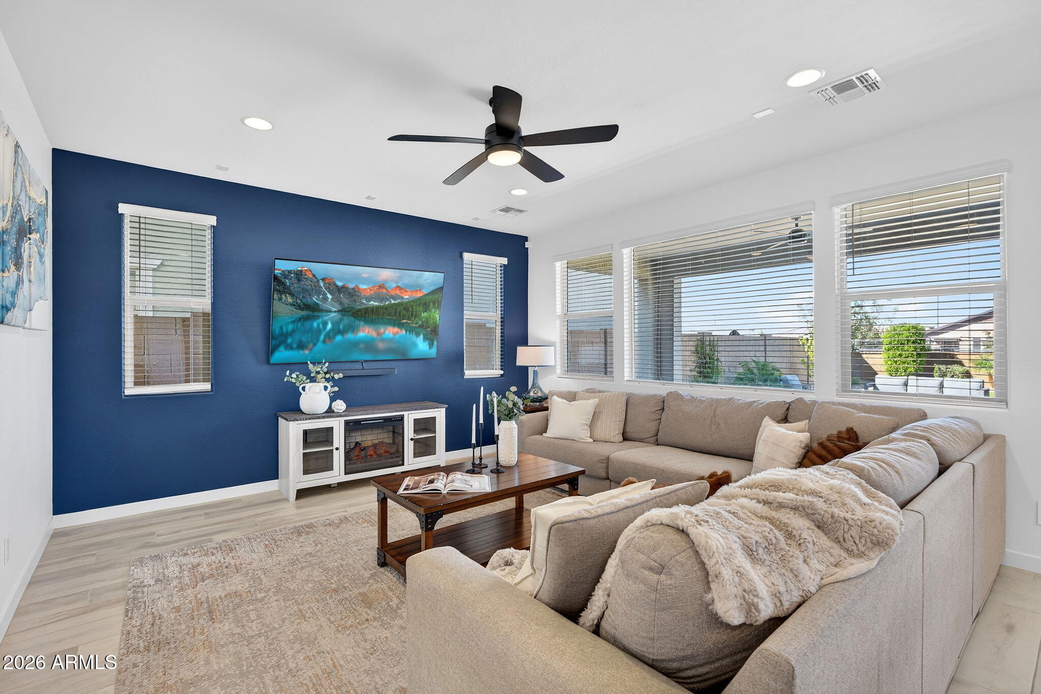 4112 East Appaloosa Road Gilbert, AZ 85296 - Photo 9 of 66 a living room with furniture and a large window