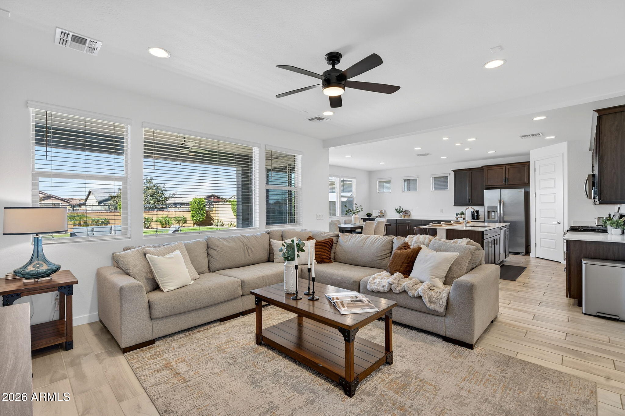 4112 East Appaloosa Road Gilbert, AZ 85296 - Photo 11 of 66 a living room with furniture and a large window