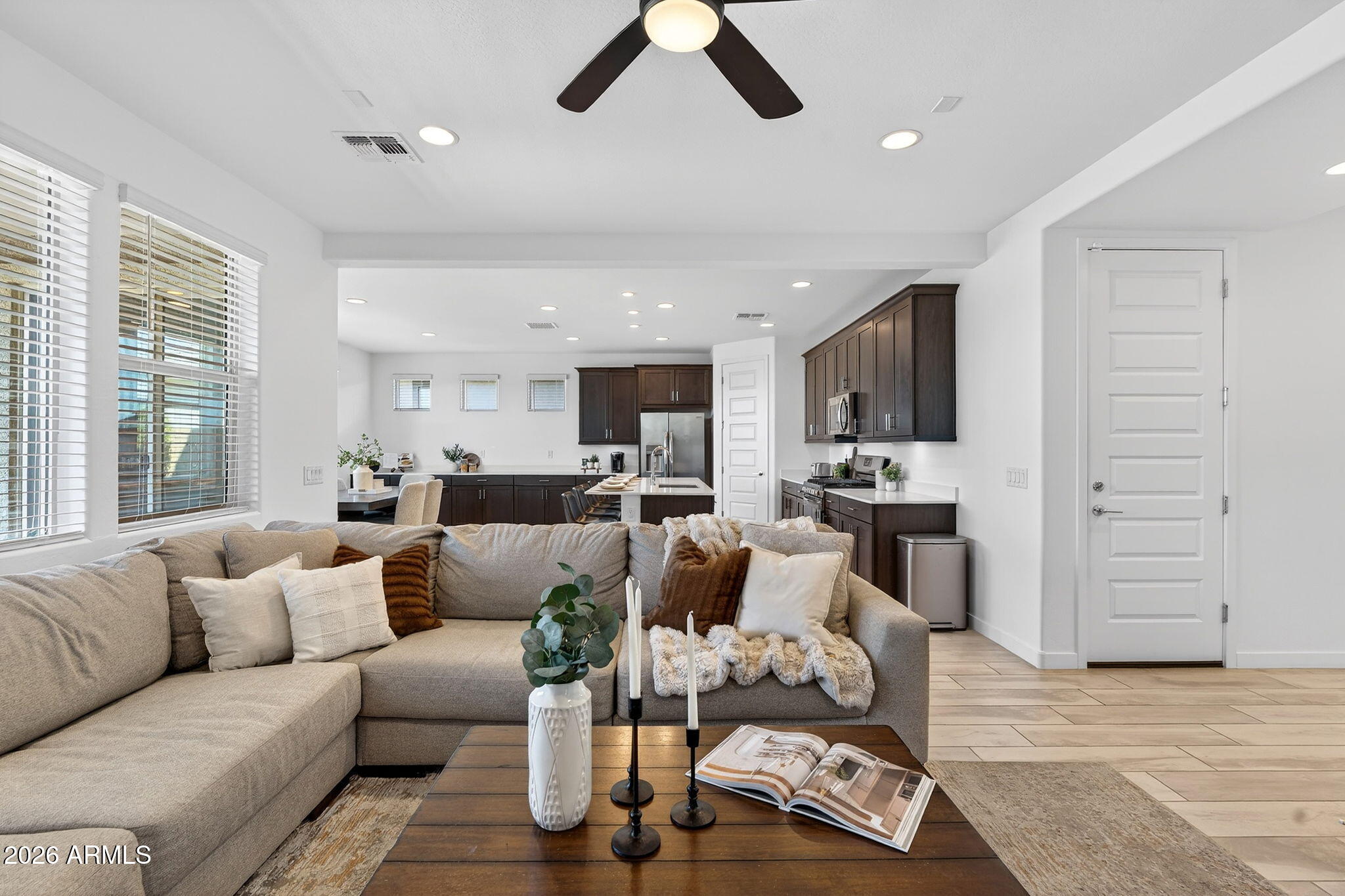 4112 East Appaloosa Road Gilbert, AZ 85296 - Photo 12 of 66 a living room with furniture and view of kitchen