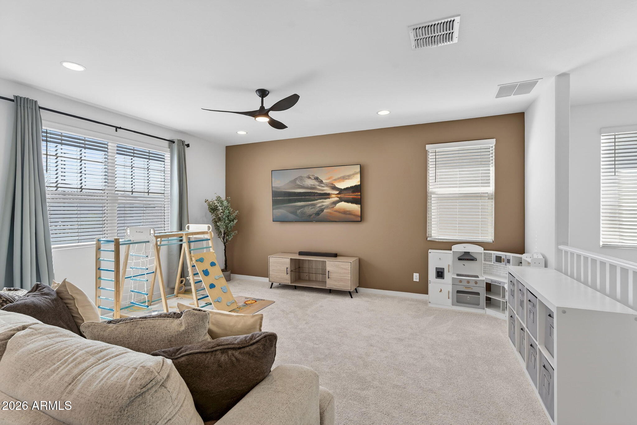 4112 East Appaloosa Road Gilbert, AZ 85296 - Photo 27 of 66 a living room with furniture and windows