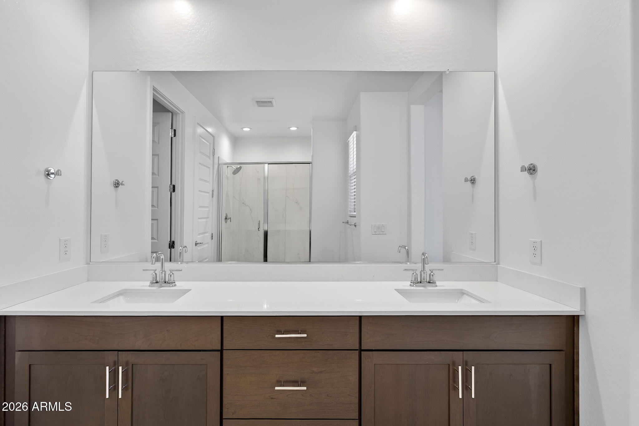 4112 East Appaloosa Road Gilbert, AZ 85296 - Photo 33 of 66 a bathroom with a sink and a mirror