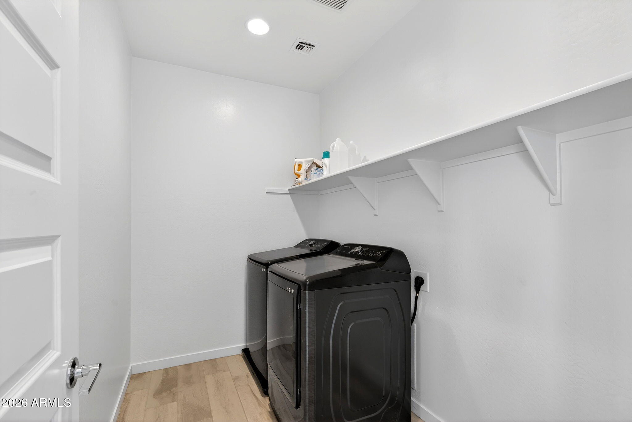 4112 East Appaloosa Road Gilbert, AZ 85296 - Photo 43 of 66 a view of hallway with washer and dryer
