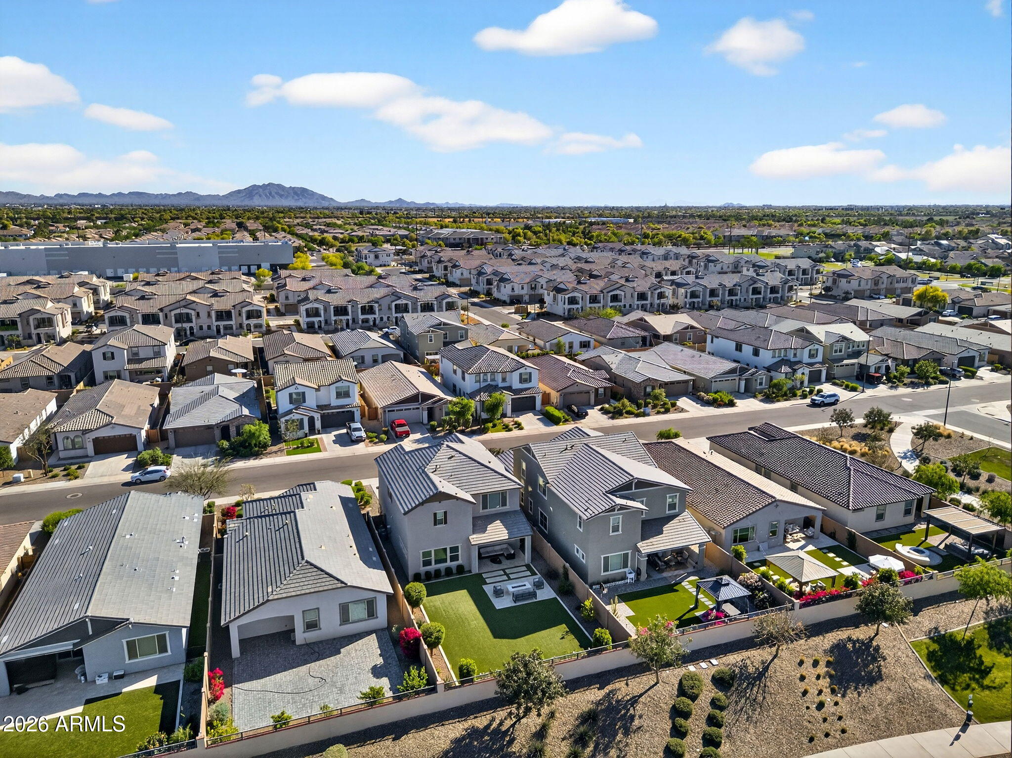 4112 East Appaloosa Road Gilbert, AZ 85296 - Photo 53 of 66 an aerial view of residential houses with outdoor space