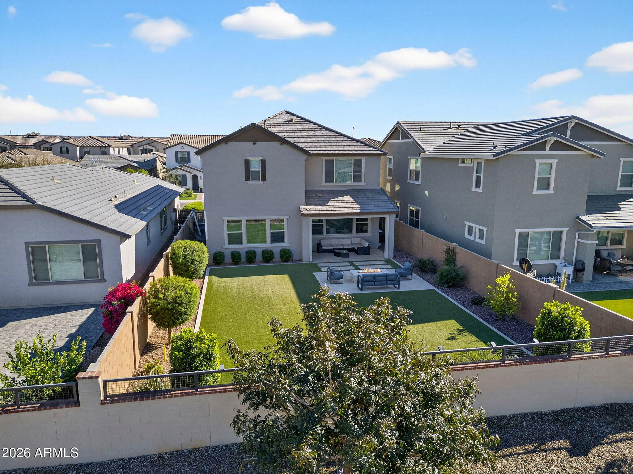 4112 East Appaloosa Road Gilbert, AZ 85296 - Photo 56 of 66 a aerial view of a house with swimming pool and porch