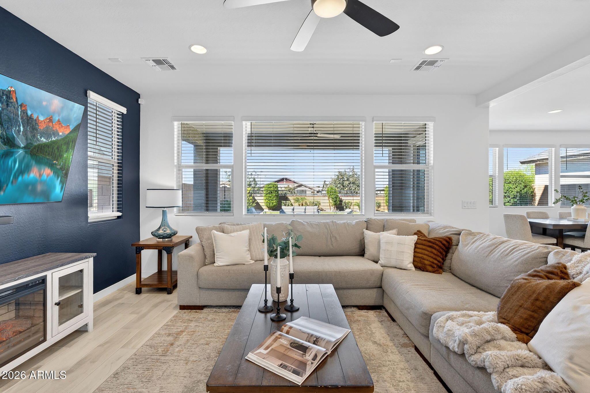 4112 East Appaloosa Road Gilbert, AZ 85296 - Photo 4 of 66 a living room with furniture and a flat screen tv